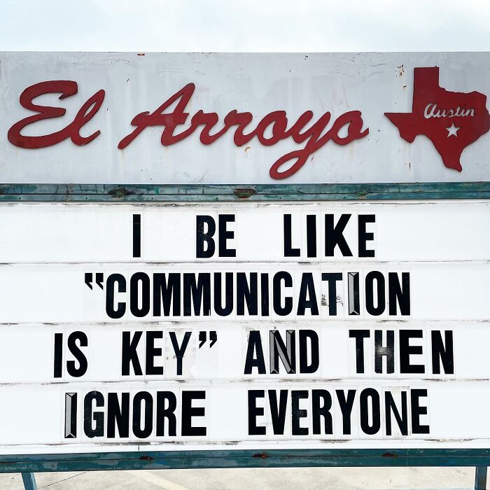 Restaurant sign with a humorous message on communication.
