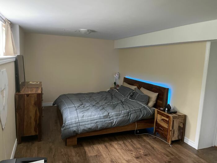 Instead Of Buying A Home In Toronto We Helped Renovate My 91 Year Old Grandmothers Basement Into A Fully Self Contained 2 Bedroom Apartment. We’re Still In The City But Only Paying $700/ Month. Here’s The Master With Hand Me Down Solid Wood Furniture