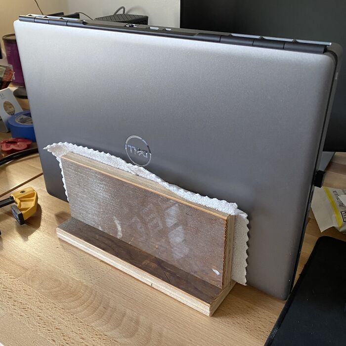 I Wanted To Hide My Laptop Vertically Behind My Monitors. It's Not Pretty, But 30 Minutes And Some Scrap Plywood Saved Me $50 And Some Desk Space