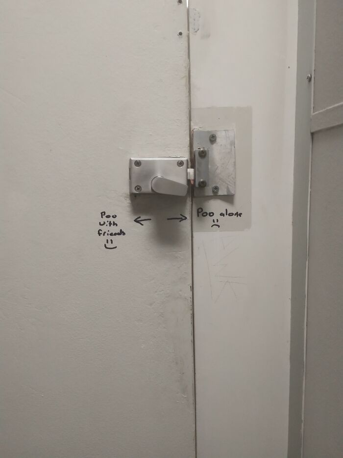 Graffiti In A Bathroom Stall