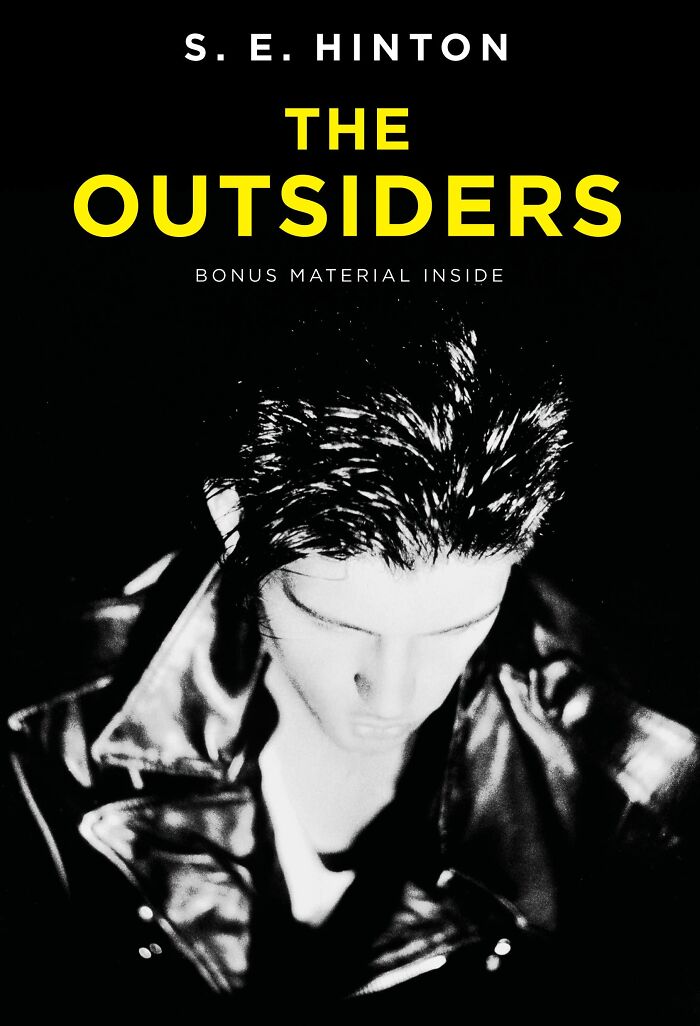 Book cover of The Outsiders by S. E. Hinton featured in folks online list of books that blew their minds and changed lives.