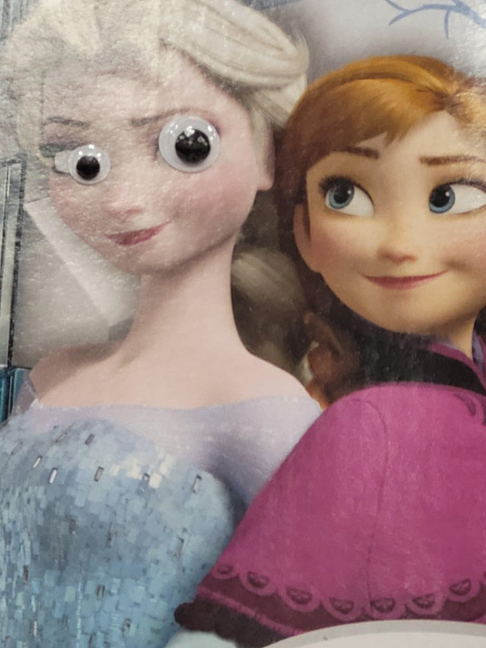 Frozen characters with added wiggle eyes, showing how wiggle eyes made random objects better in humorous eyebombing.