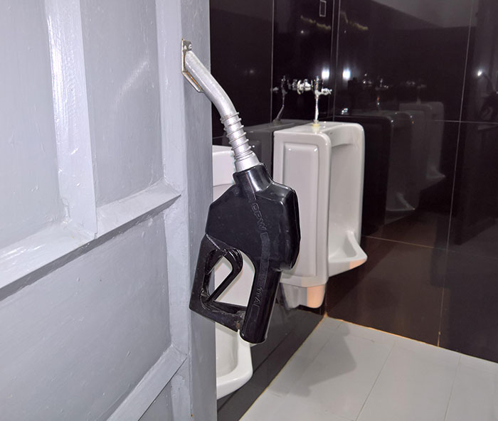 A Gas Station In My Country Uses Gas Pump Handles As Door Handles For Their Restrooms