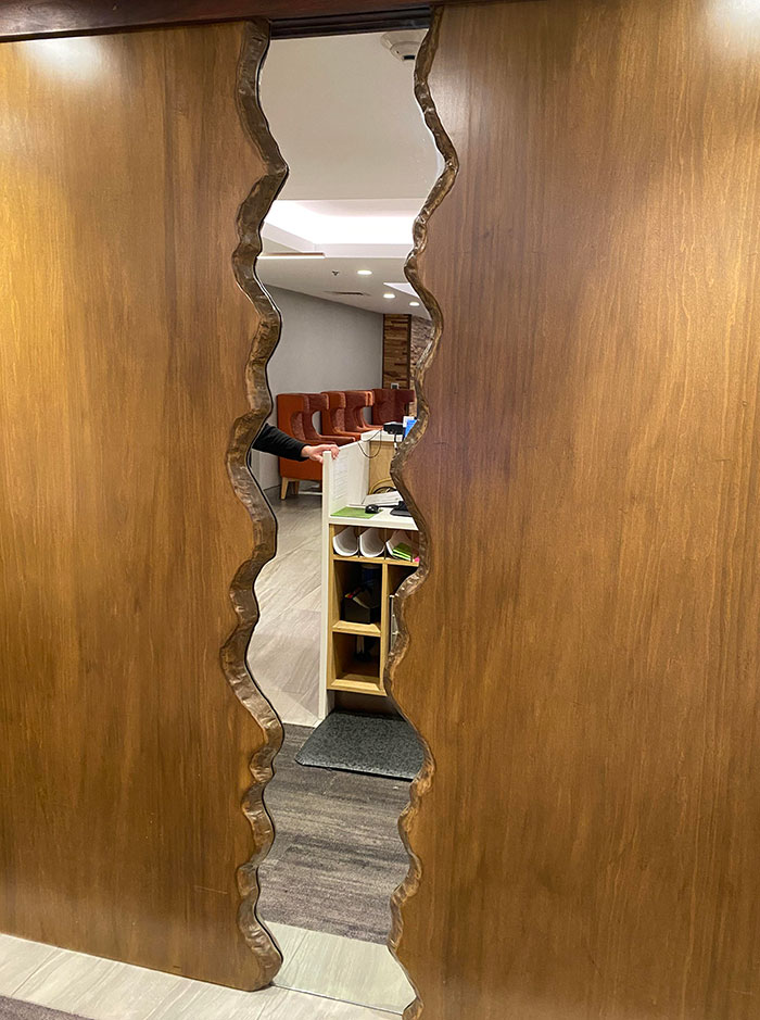 This Mirror In The Front Of My Hotel Looks Like You Can Walk Through It