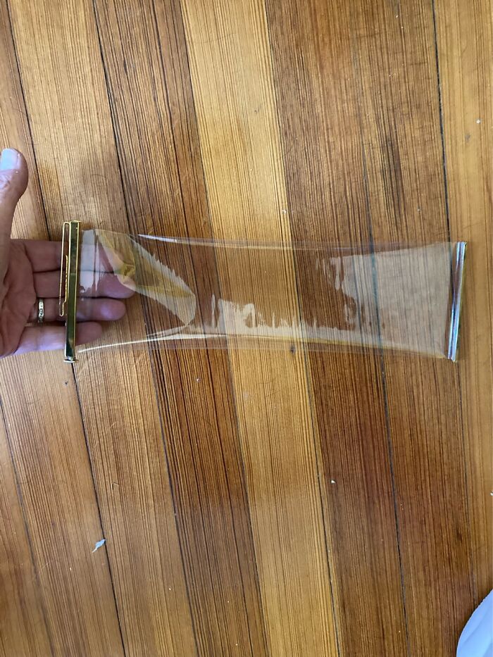 What Is This? Cellophane Pulls Out, Has Roller To Bring It Back In!?!?