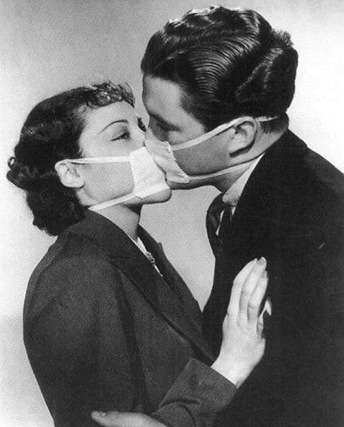 Kissing With Surgical Masks As To Prevent Infection During The Onset Of The Flu Epidemic | 1937