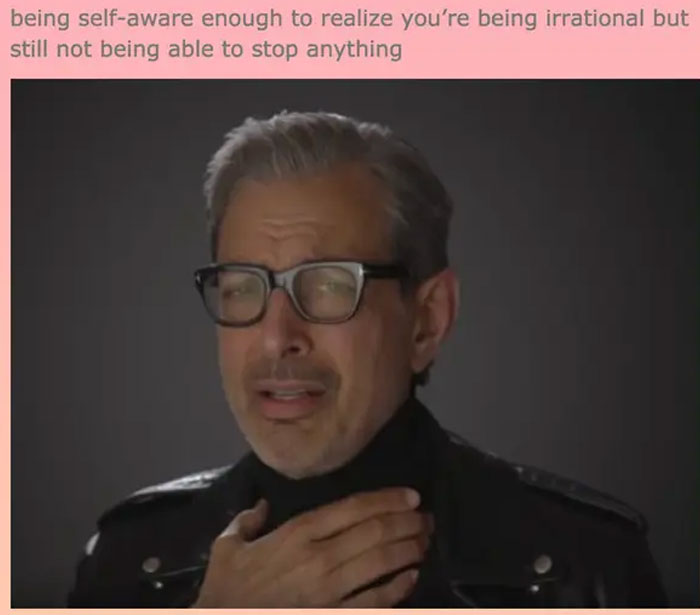 Man with glasses looking emotional, holding his neck; relates to overthinking humor and memes.