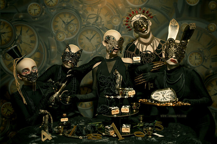 Dark Alice characters in elaborate masks and costumes, surrounded by clocks and peculiar objects in a surreal setting.