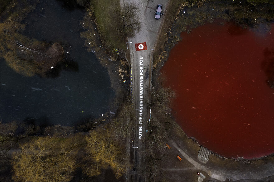 "Swimming Through": We Dyed The Pond In Front Of The Russian Embassy In Lithuania So That It Looks Like Blood "Swimming Through": We Dyed The Pond In Front Of The Russian Embassy In Lithuania So That It Looks Like Blood