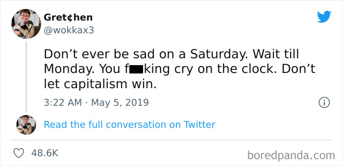 Tweet humorously addressing office life, suggesting not to be sad on weekends but on Monday instead.