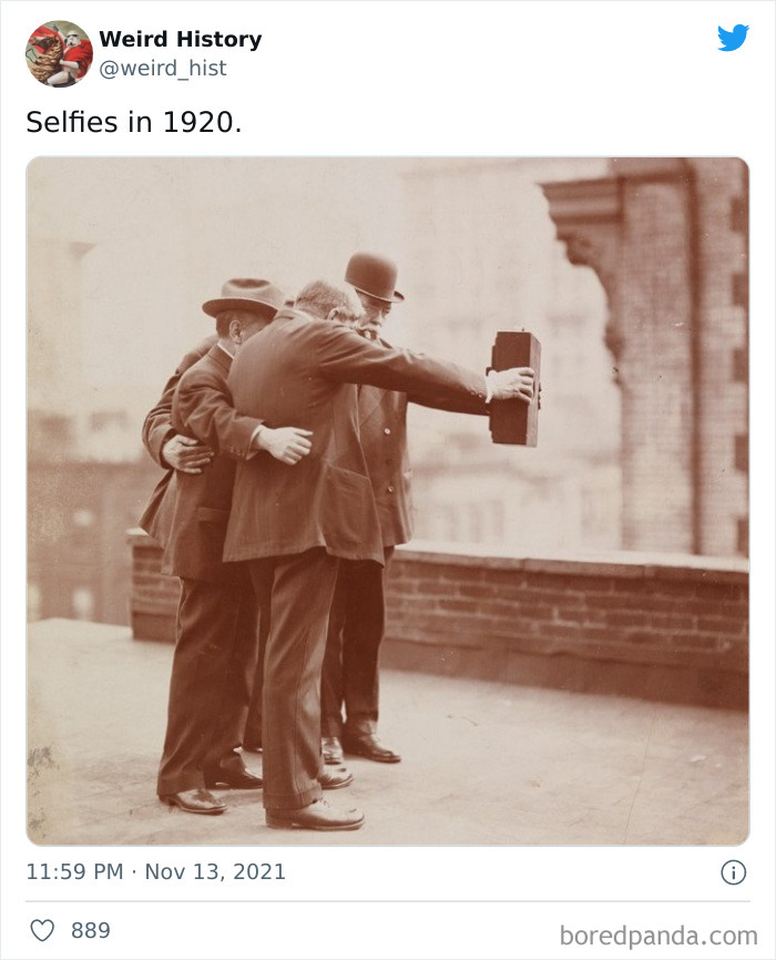 Three men in 1920s attire taking a group selfie with an early box camera, illustrating weird history moments.