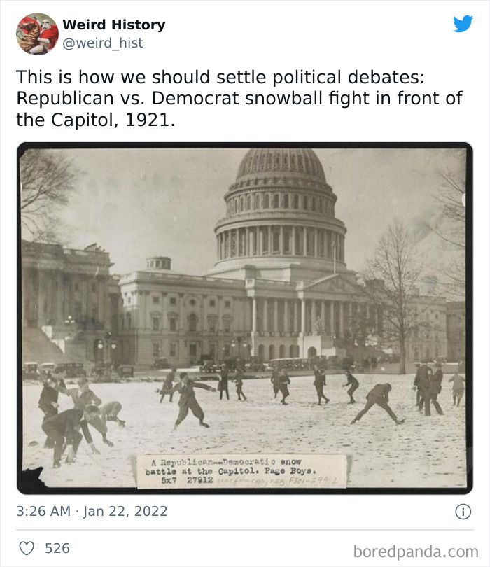 Historic photo of a weird history political snowball fight between Republicans and Democrats in front of the Capitol in 1921.