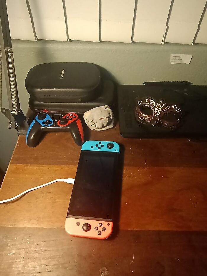 Nintendo, A Sock, My Drawing Pad (With Laptop Beneath) And A Mask (Randomly)