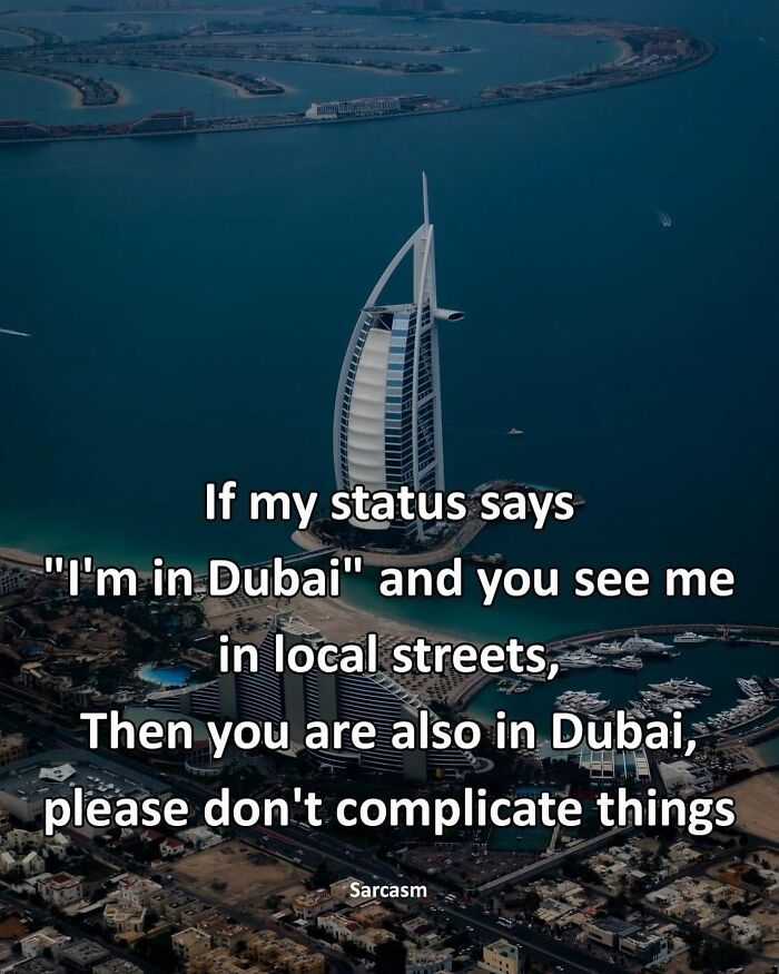 Hilarious meme about being in Dubai with a view of the Burj Al Arab from the 'Sarcasm Only' Instagram account.