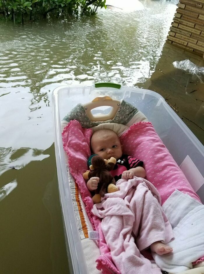 Floater Baby - Mother Who Was Waiting For Rescue During The Hurricane Shared A Picture Of Her Baby Floating In A Large Plastic Container