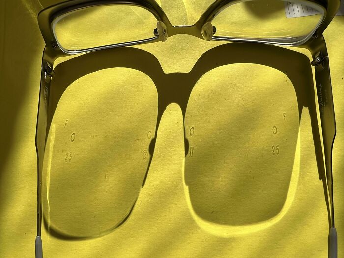 These Letters And Numbers Are Invisible On My Lenses, But Cast Shadows