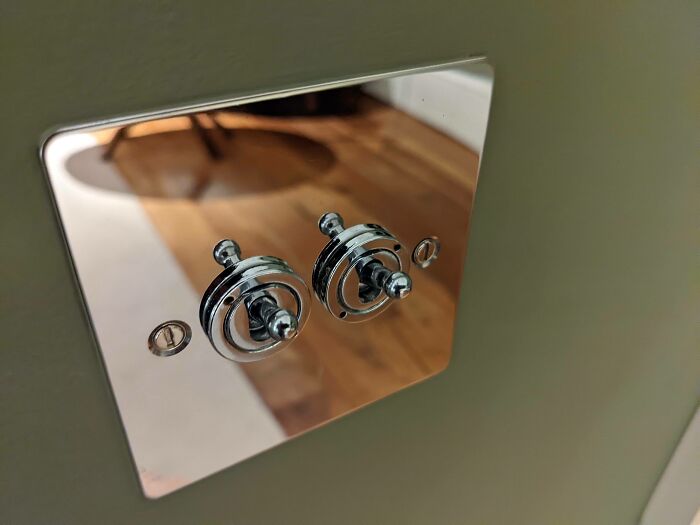 All The Light Switches In My Hotel Room Are These Chrome Toggles