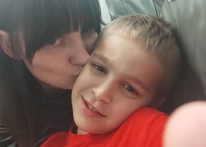 Video Shows Young Boy Stopping To Hug Two Stray Dogs When He Thinks No One Is Watching Video Shows Young Boy Stopping To Hug Two Stray Dogs When He Thinks No One Is Watching