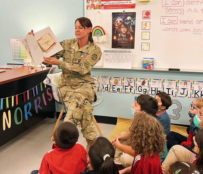 Woman Is Frozen In Place After Seeing Her Mom Enter The Classroom She&rsquo;s Teaching After 11 Months Of Deployment