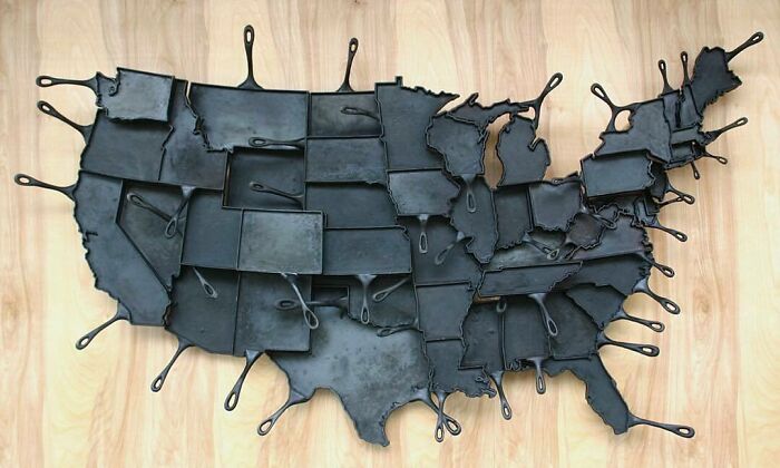 A Map Of The Continental USA Made Of 550 Pounds Of Cast-Iron Skillets