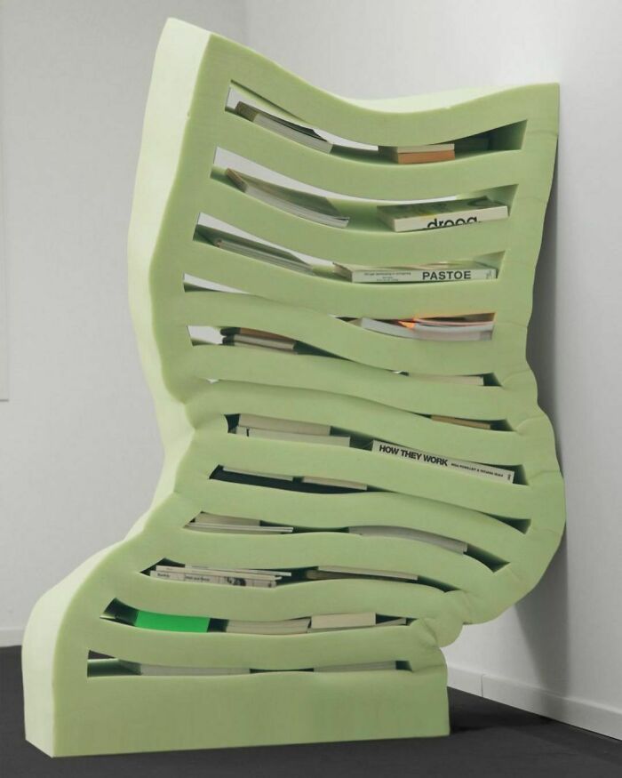 Books, Plates And Glasses Are Engulfed By The Squishy Shelves Of Dutch Designer Dewi Van De Klomp's Soft Cabinets, Which Are Made From Foam Rubber In A Bid To Bring More Attention To The "Overlooked" Material