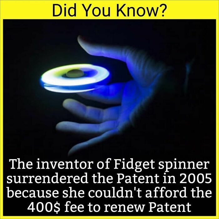 Hand holding a glowing fidget spinner with a fact about its inventor surrendering the patent due to renewal fees.