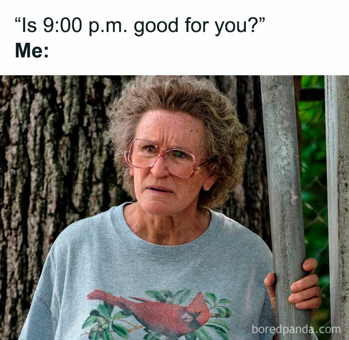 Millennial meme depicting a tired woman in glasses with a confused expression, wearing a t-shirt with a cardinal print.