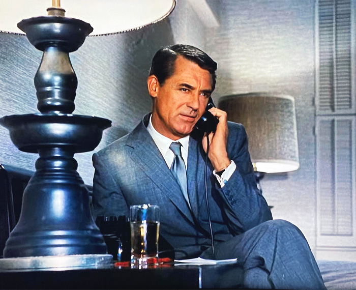 Cary Grant speaking by phone