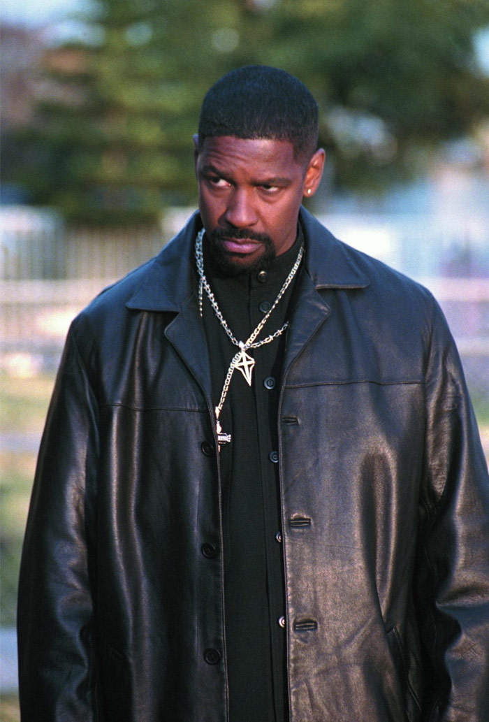 Denzel Washington in a black leather jacket