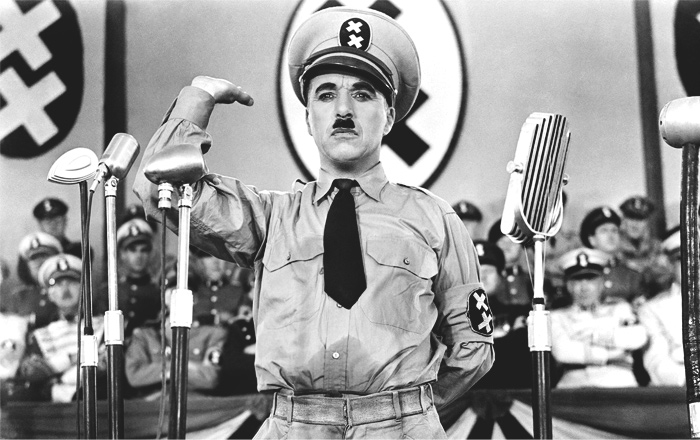 Charlie Chaplin in a costume on the stage