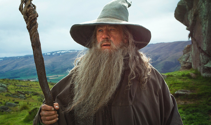 Ian McKellen with a long beard and in a hat