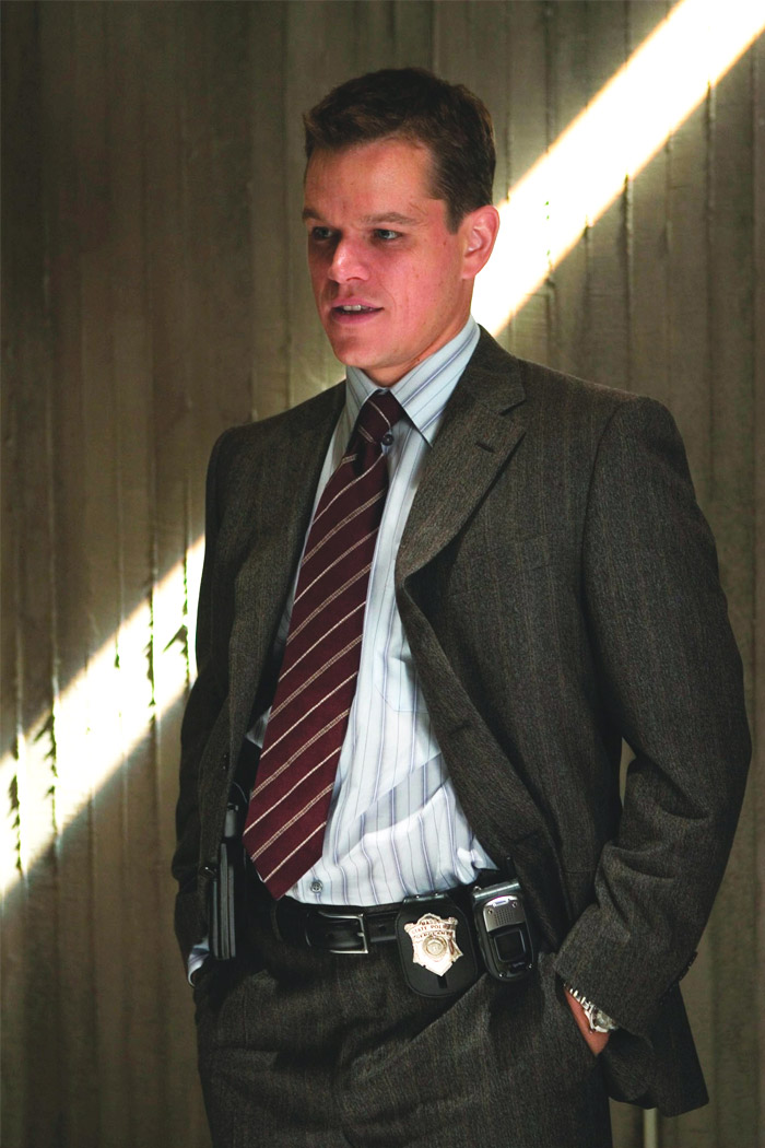 Matt Damon telling something in a costume