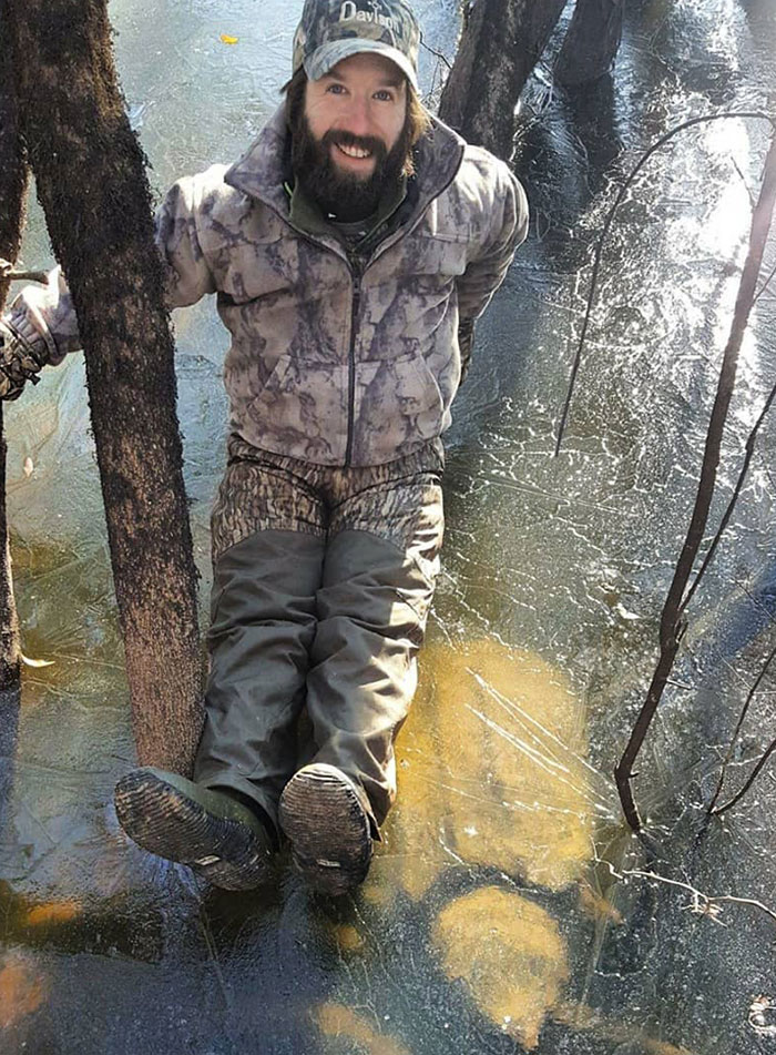 An Alligator Snapping Turtle Hibernating Under A Sheet Of Ice