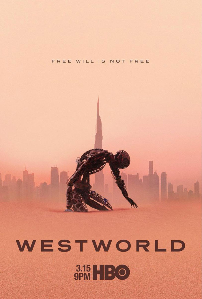 Robot rising from sand in a futuristic cityscape, promoting Westworld, an HBO TV show.