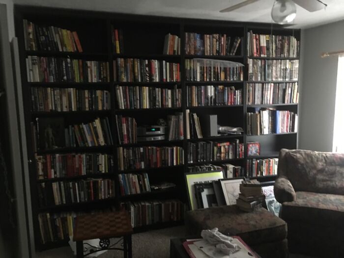 My Library So Far. Still Need To Get Shelves For The Other Side Of The Room. Nice And Comfy