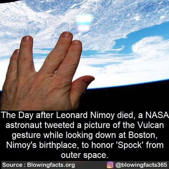Hand showing Vulcan salute from space with a view of Earth, illustrating incredible facts shared on an Instagram account.