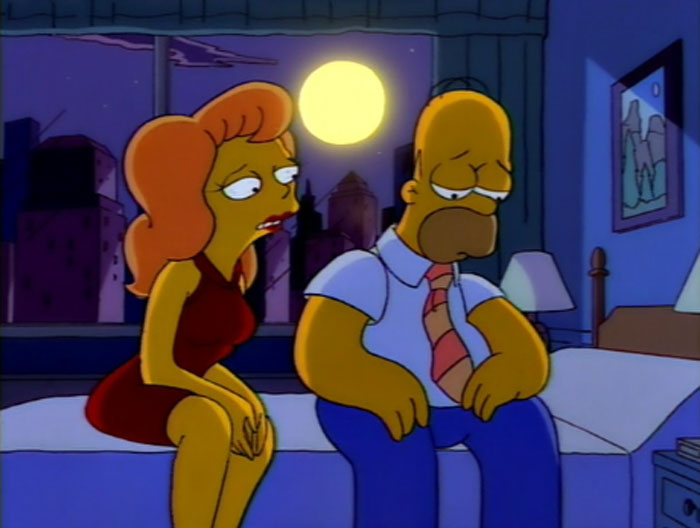Homer from The Simpsons sitting on a bed at night with a worried expression while a woman in red talks to him.
