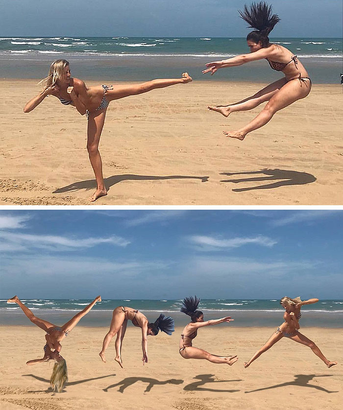 Two People "Fighting" On The Beach