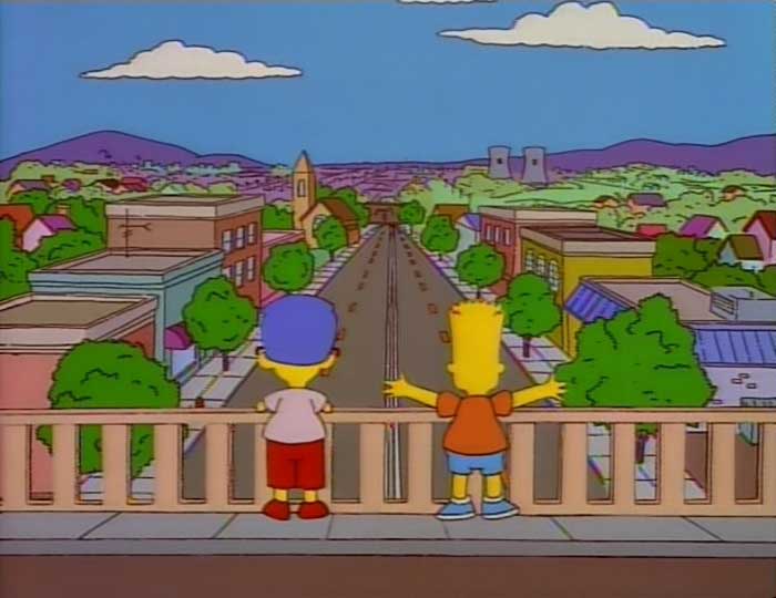 Two Simpsons characters standing on a bridge overlooking Springfield street, highlighting Simpsons fans' small detail theories.