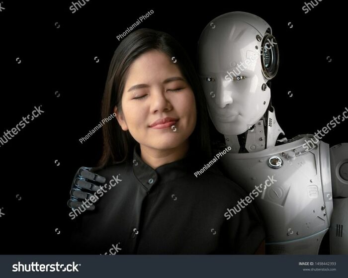 Woman enjoying the company of a robot, showcasing one of the weirdest stock images available online.