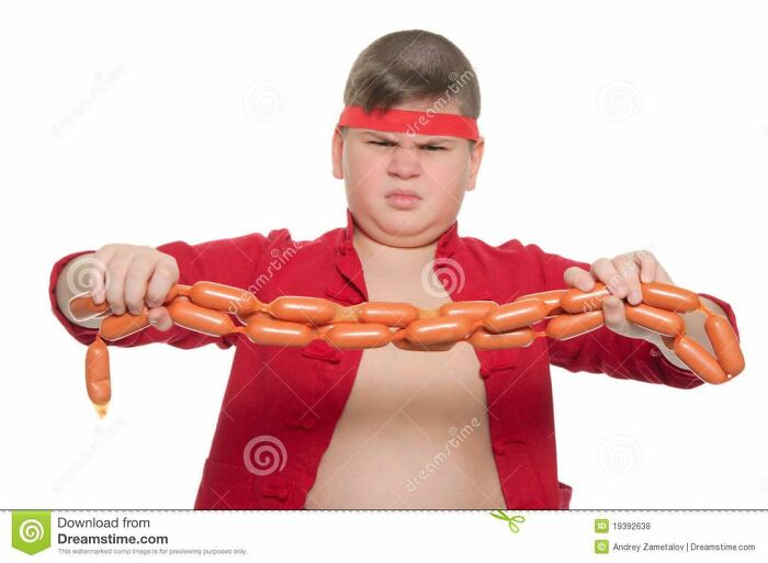 Child with red headband holding sausages, featuring a weird stock photo theme.