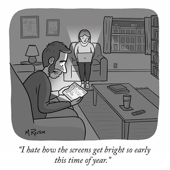 Comic depicting a man and woman in a living room with screens glowing bright, poking fun at society and daily life.