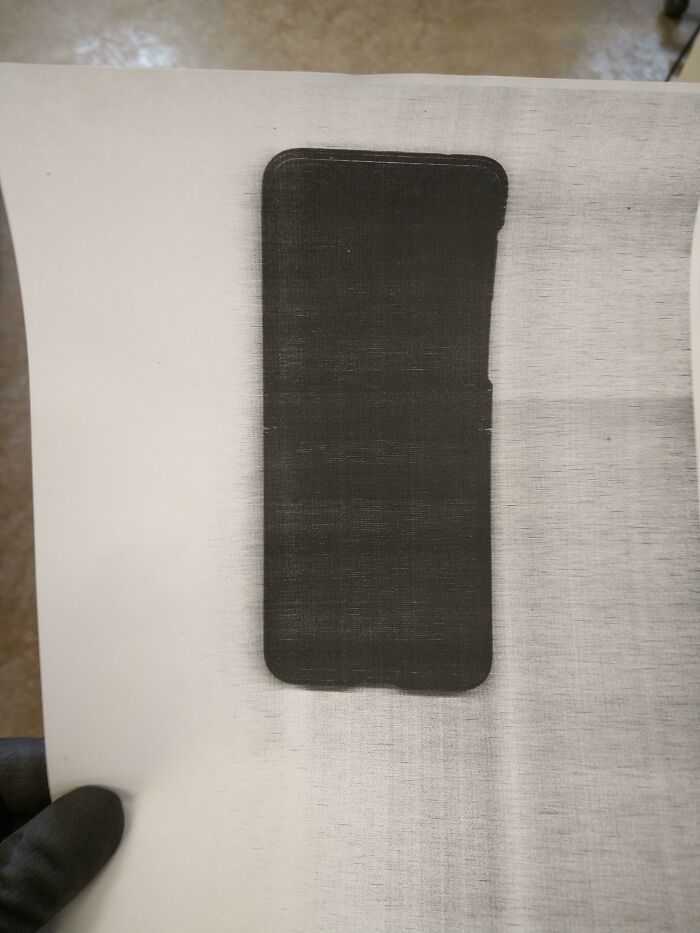 Coworker Didn't Know How To Take A Screenshot And Decided To Photocopy The Phone