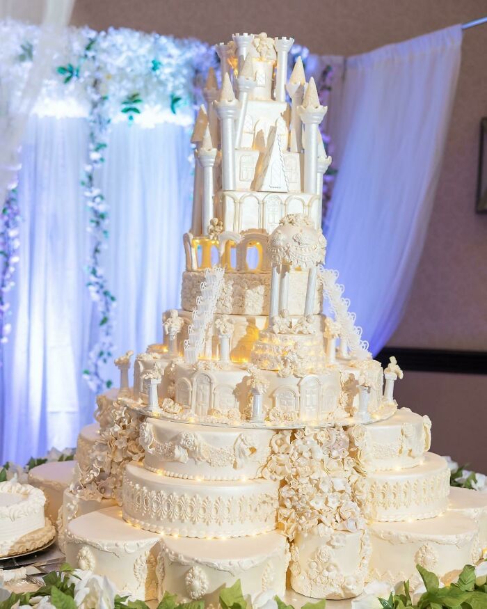 Elaborate wedding cake with castle design, symbolizing celebration and love beyond mothers-in-law stereotypes.