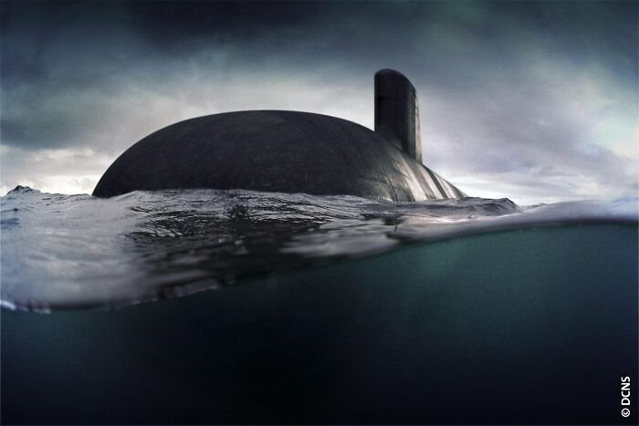 Submarine partially submerged in dark ocean waters, evoking feelings of thalassophobia and fear of deep waters.