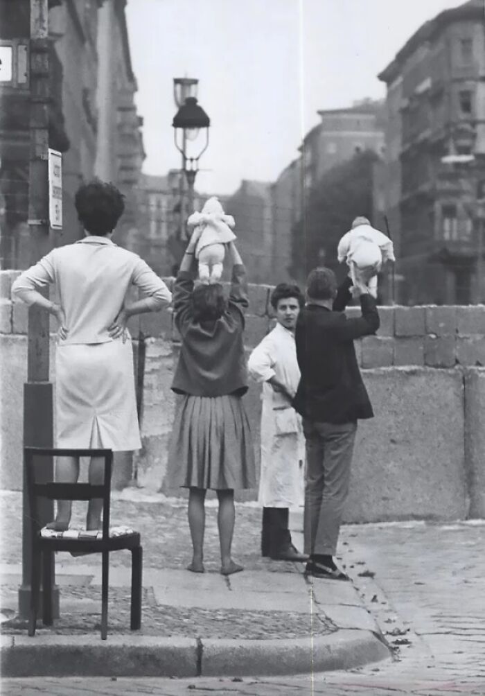Residents Of West Berlin Show Their Children To Their Grandparents Living In East Berlin, 1961