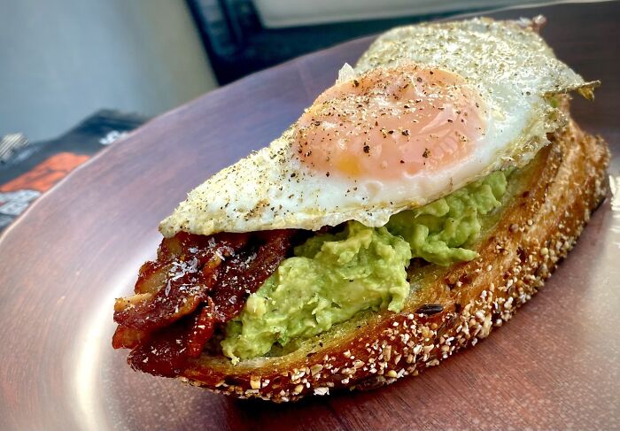 Avocado Toast With Bourbon Glazed Bacon, Fried Egg