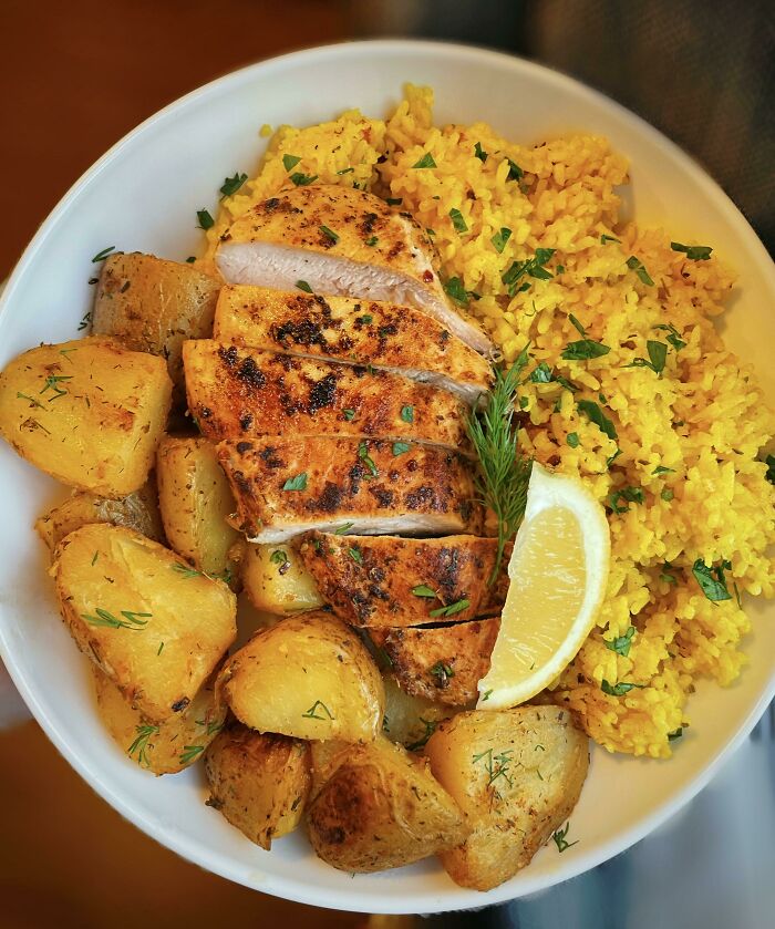 Greek Chicken, Roasted Lemon Garlic Herb Potatoes, And Yellow Rice!
