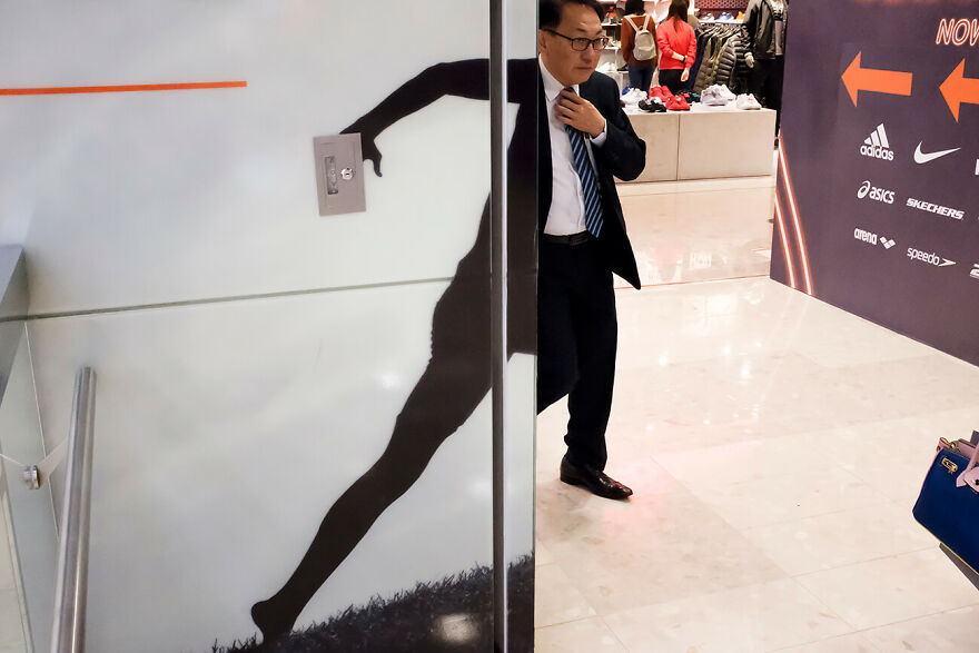 Man In A Hurry From The Series 'Hong Kong Street Photography' © Kin Wing Edas Wong