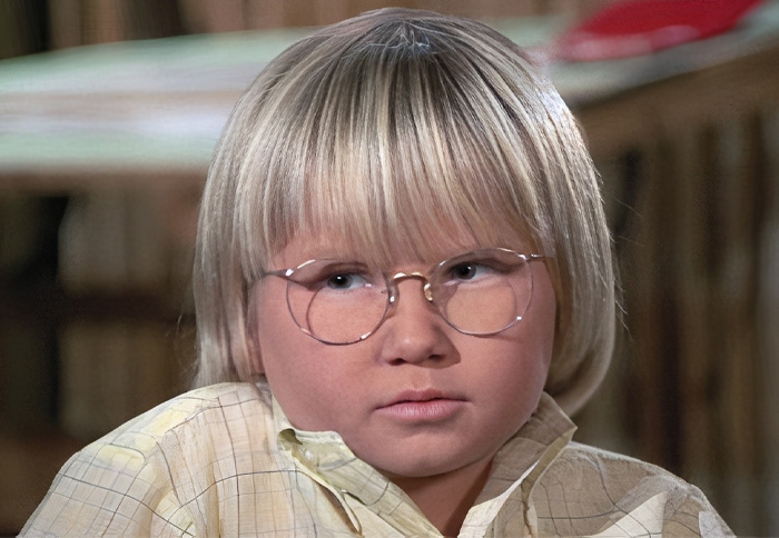 Cousin Oliver in the glasses